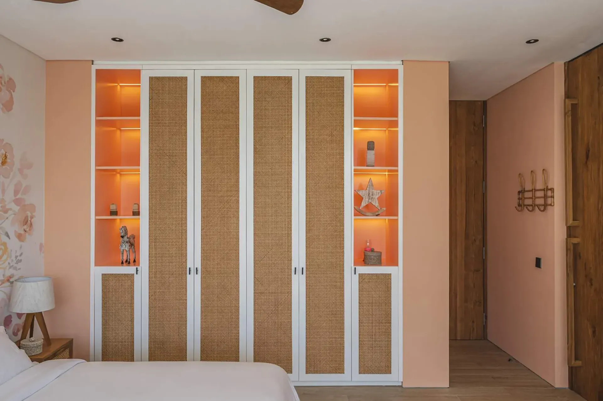 Bedroom with backlit wardrobe