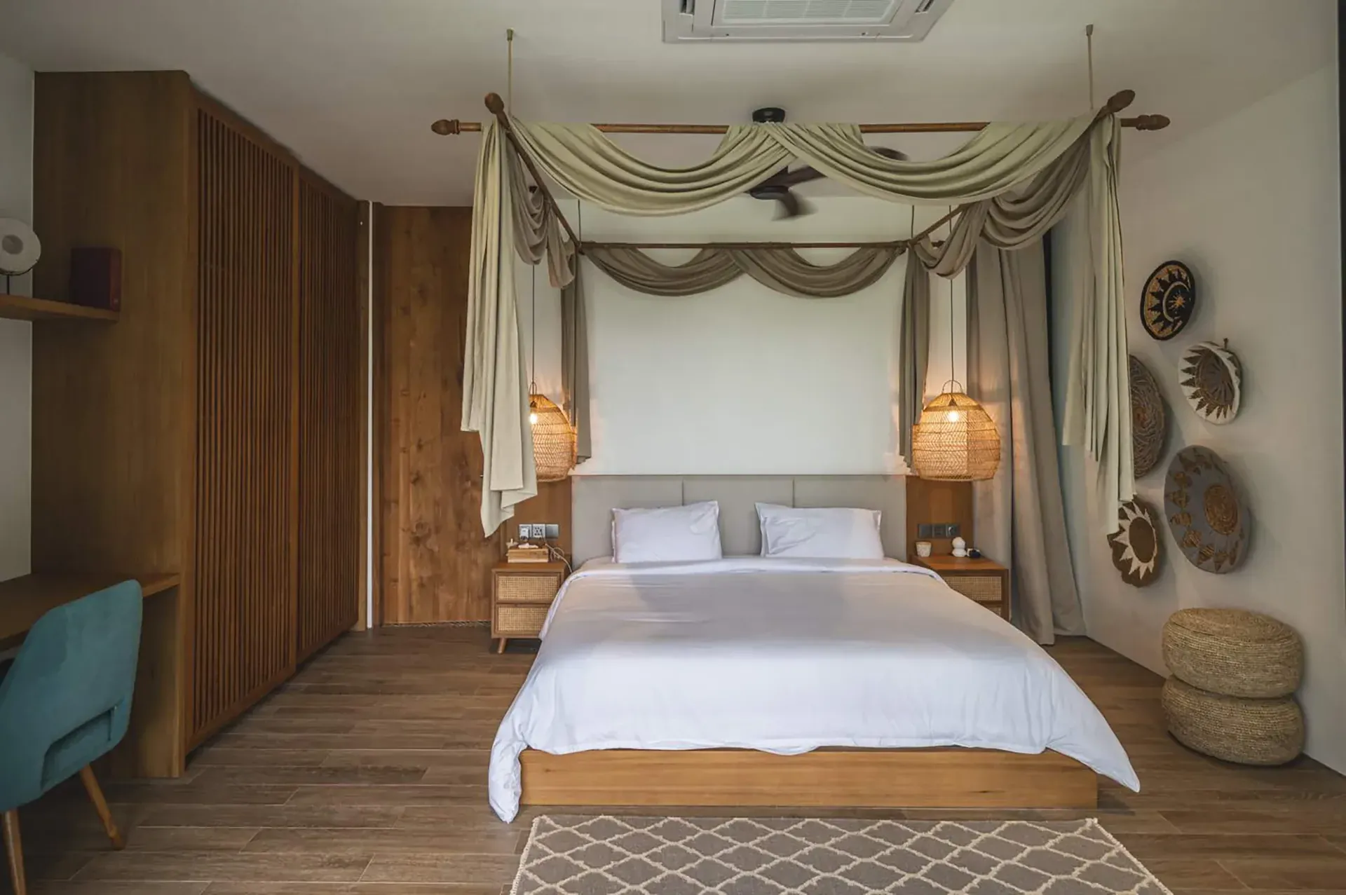 Bedroom with draped canopy