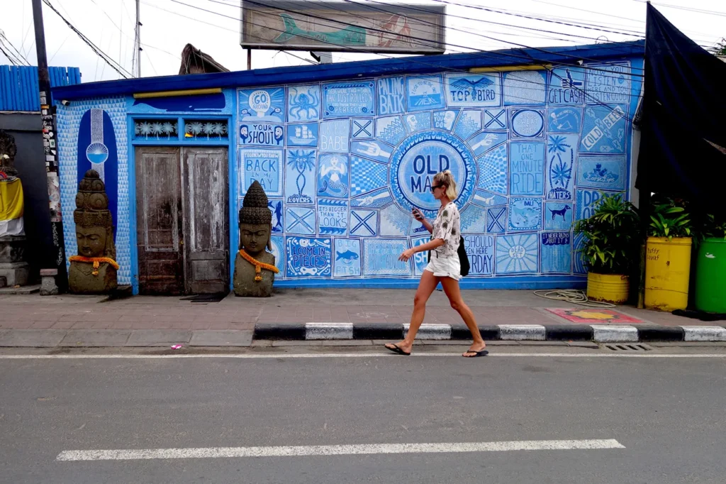 Woman walking on a street in Batu Bolong, Canggu, Bali